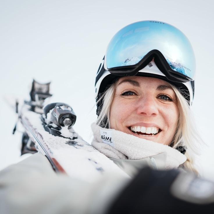 Anya Rao, Lead Design Curator at Delft Harbor Lilt, reviewing corporate floral arrangements